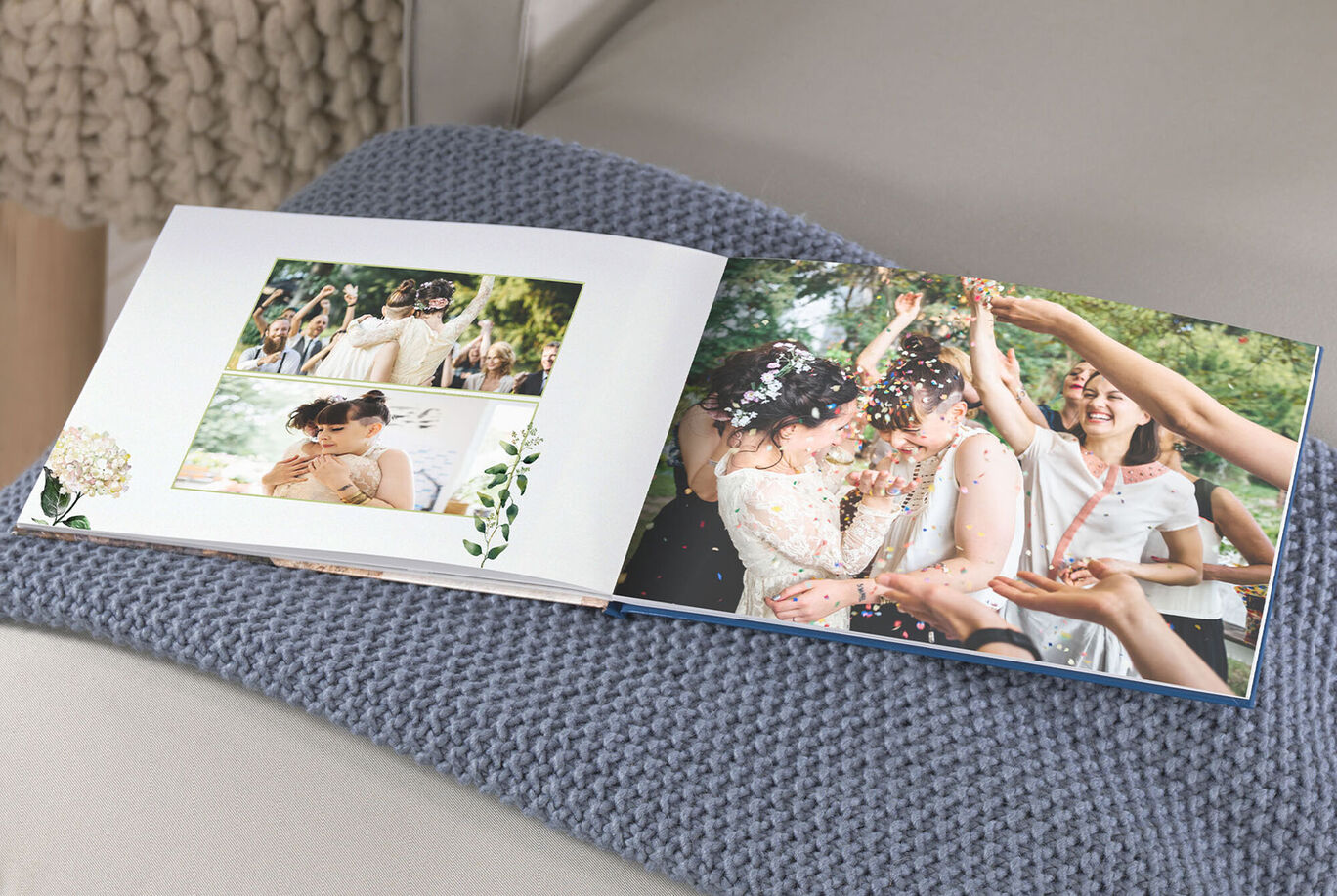 An open photo book with cheerful wedding pictures on a cozy couch.