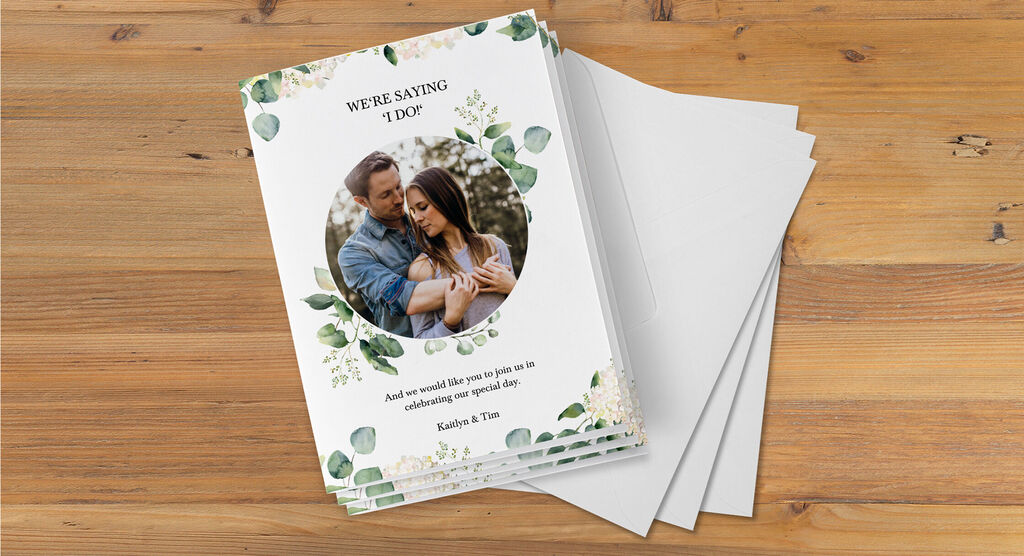 Couple with flower design on wedding invitation