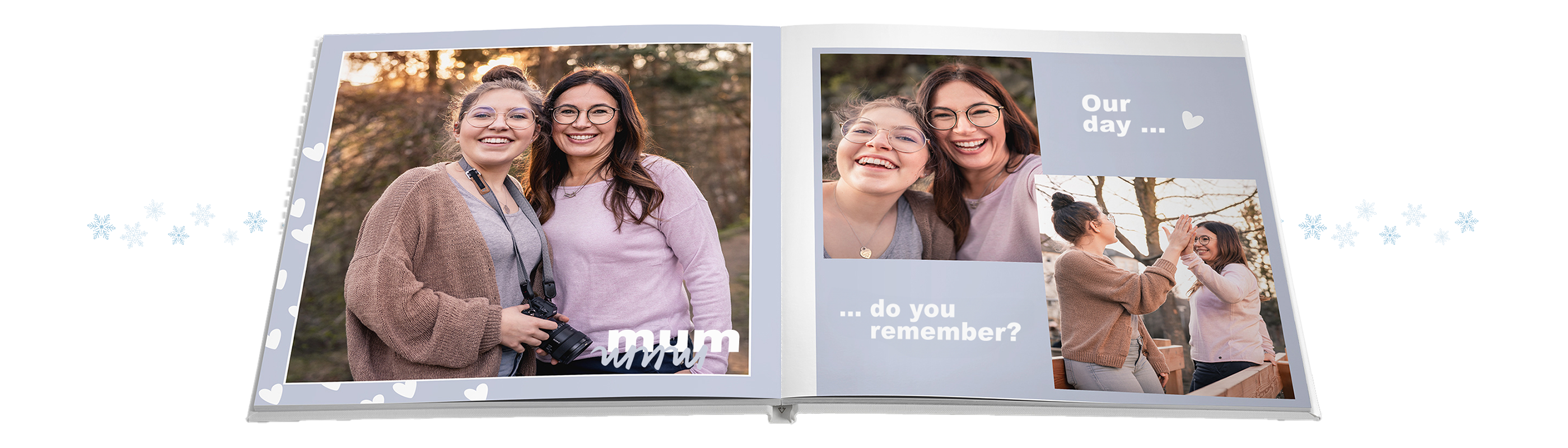 Two women joyfully look into a CEWE photobook and capture memories