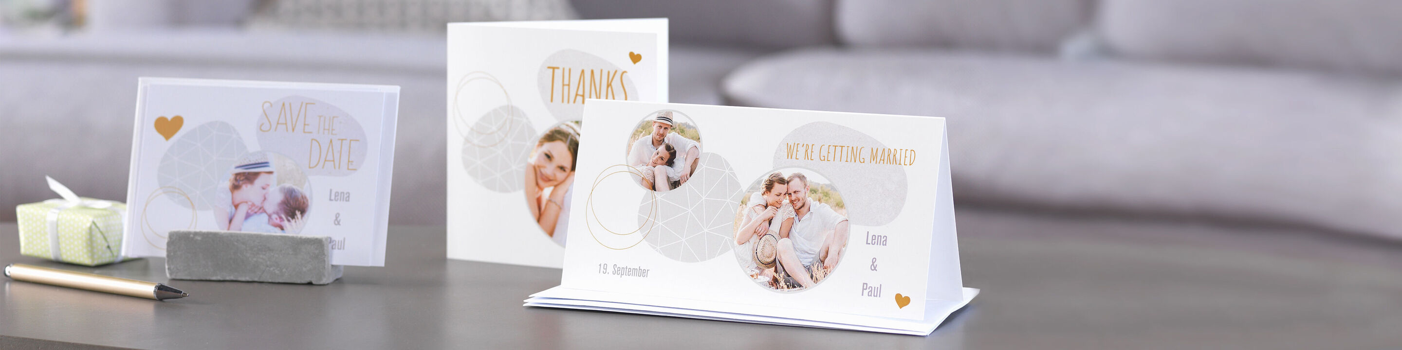 Beautiful greeting cards with photos and loving messages on a table