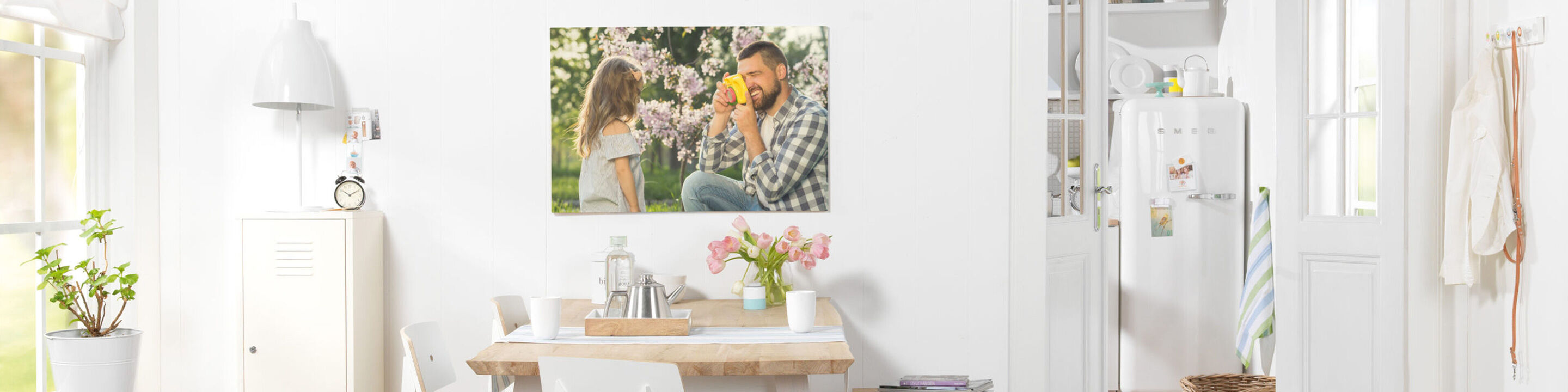 Wonderful wall picture of a joyful family spending time in the garden.