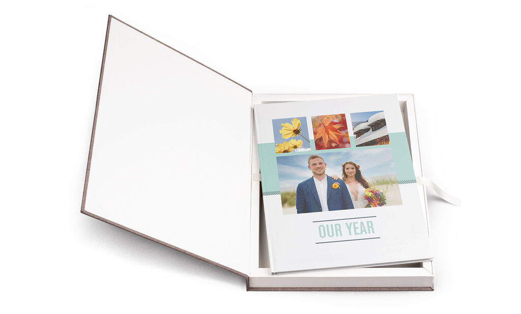 Beautiful photo book with a wedding couple on the cover and colorful images.